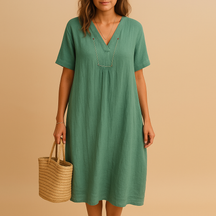 Lichte en ademende zomerjurk voor dames in losse pasvorm. Perfect voor warme dagen en geschikt voor zowel casual als feestelijke gelegenheden.
