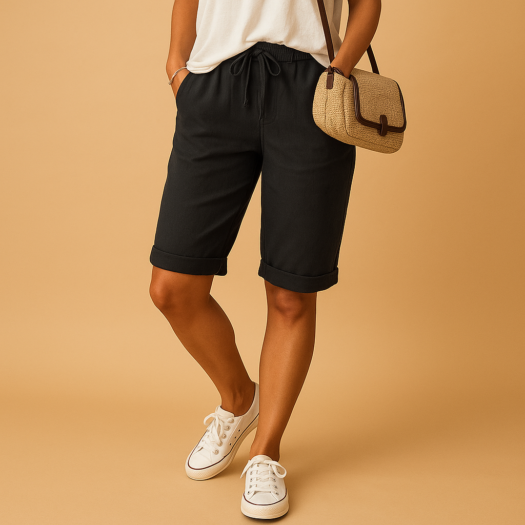 Dames capribroek met elastische taille en strikkoord, relaxed fit en opgerolde zoom, ideaal voor lente- en zomerdagen.