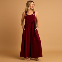 Luchtige dames overall van katoen met wijde pijpen en verstelbare bandjes, verkrijgbaar in diverse kleuren. Perfect voor warme dagen en casual comfort.
