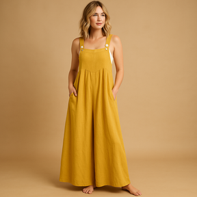 Luchtige dames overall van katoen met wijde pijpen en verstelbare bandjes, verkrijgbaar in diverse kleuren. Perfect voor warme dagen en casual comfort.