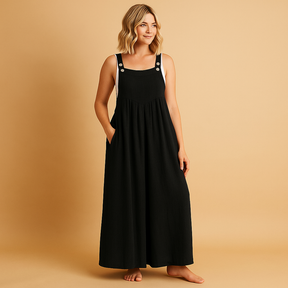 Luchtige dames overall van katoen met wijde pijpen en verstelbare bandjes, verkrijgbaar in diverse kleuren. Perfect voor warme dagen en casual comfort.