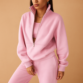 Tweedelig joggingpak voor dames met vest en halve rits in roze, groen of blauw – ideaal voor loungen of sportieve dagen.