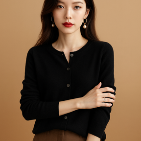 Elegante damescardigan met V-hals, knoopsluiting en lange mouwen, perfect voor laagjes en winterse outfits.