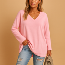 Zomerse dames top met losse pasvorm en zachte stof, ideaal voor casual en chique outfits in warme seizoenen.